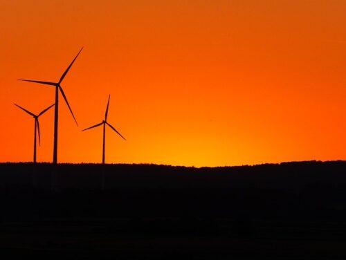 Wind turbines at sunset